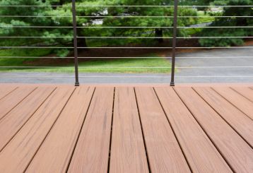 Contractors performing Trex decking screw installation on an outdoor patio in Calabasas.